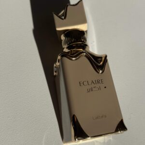 عطر ادوپرفیوم زنانه لطافه اکلایر حجم ۱۰ میل شیرین گرم